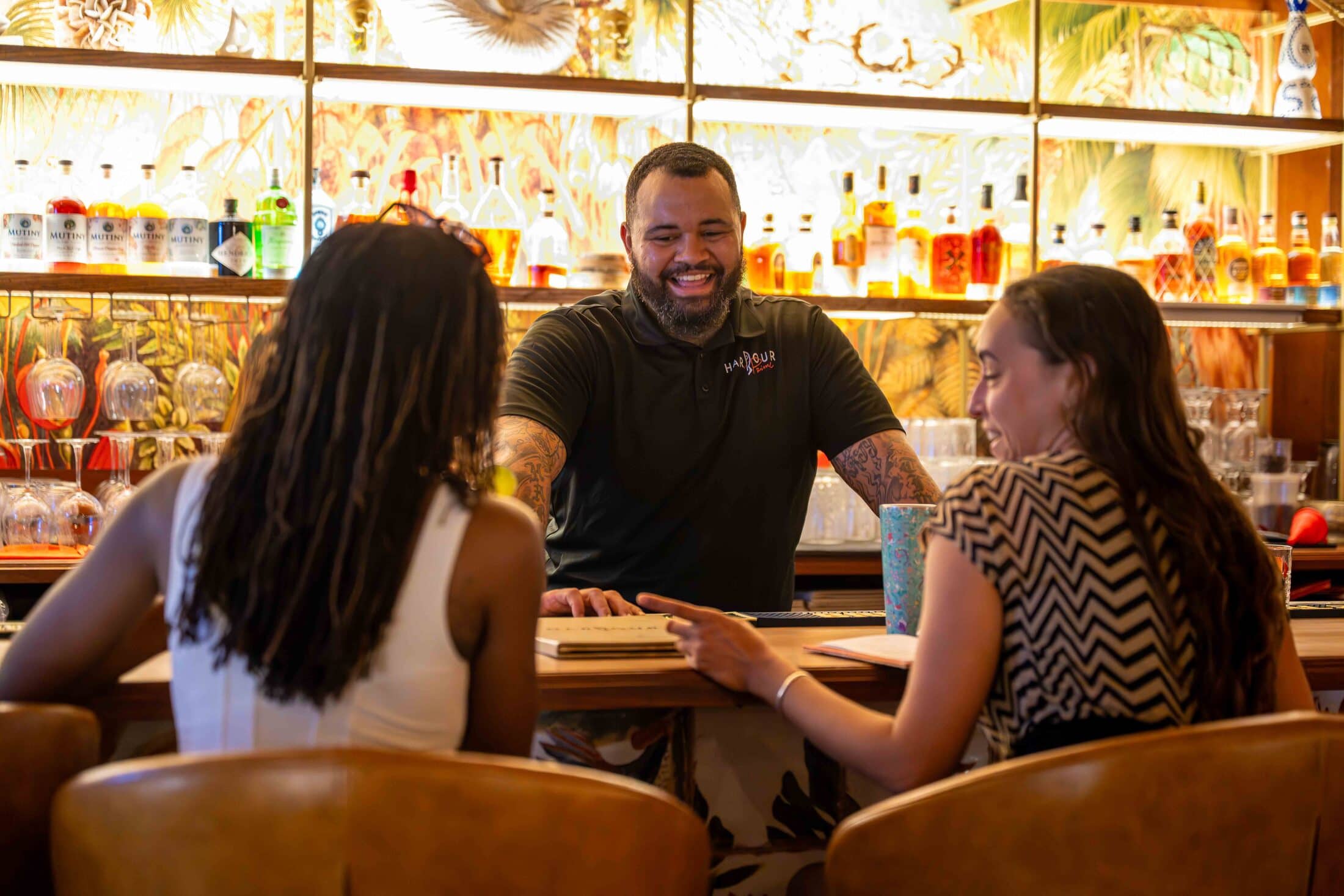 Guests enjoying craft cocktails at the Harbour Prime bar